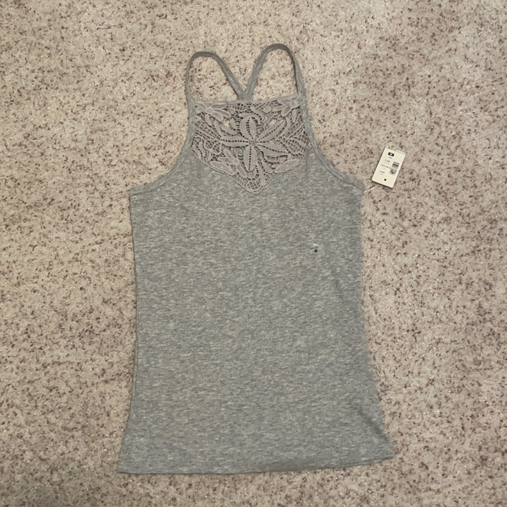 Gray tank top with design at top